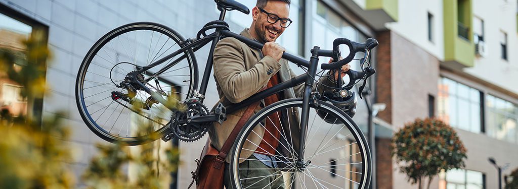 Man with Bike heading out for a ride
